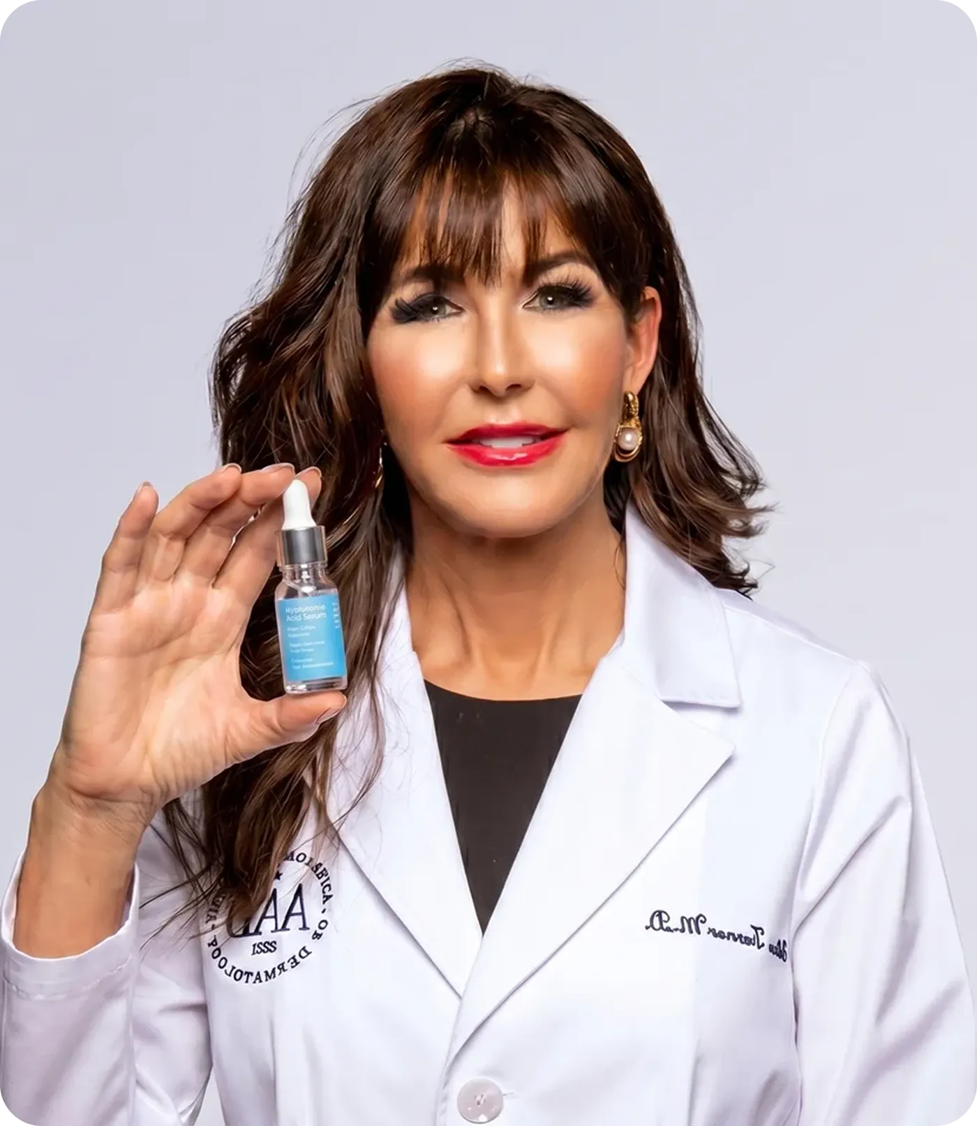 Dermatologist holding serum