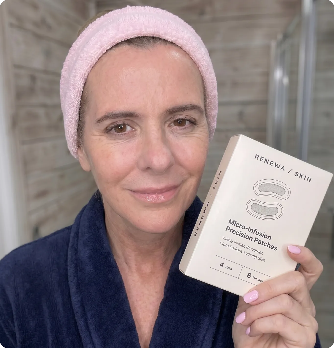 Woman holding Renewa Skin Micro-Infusion Precision Patches