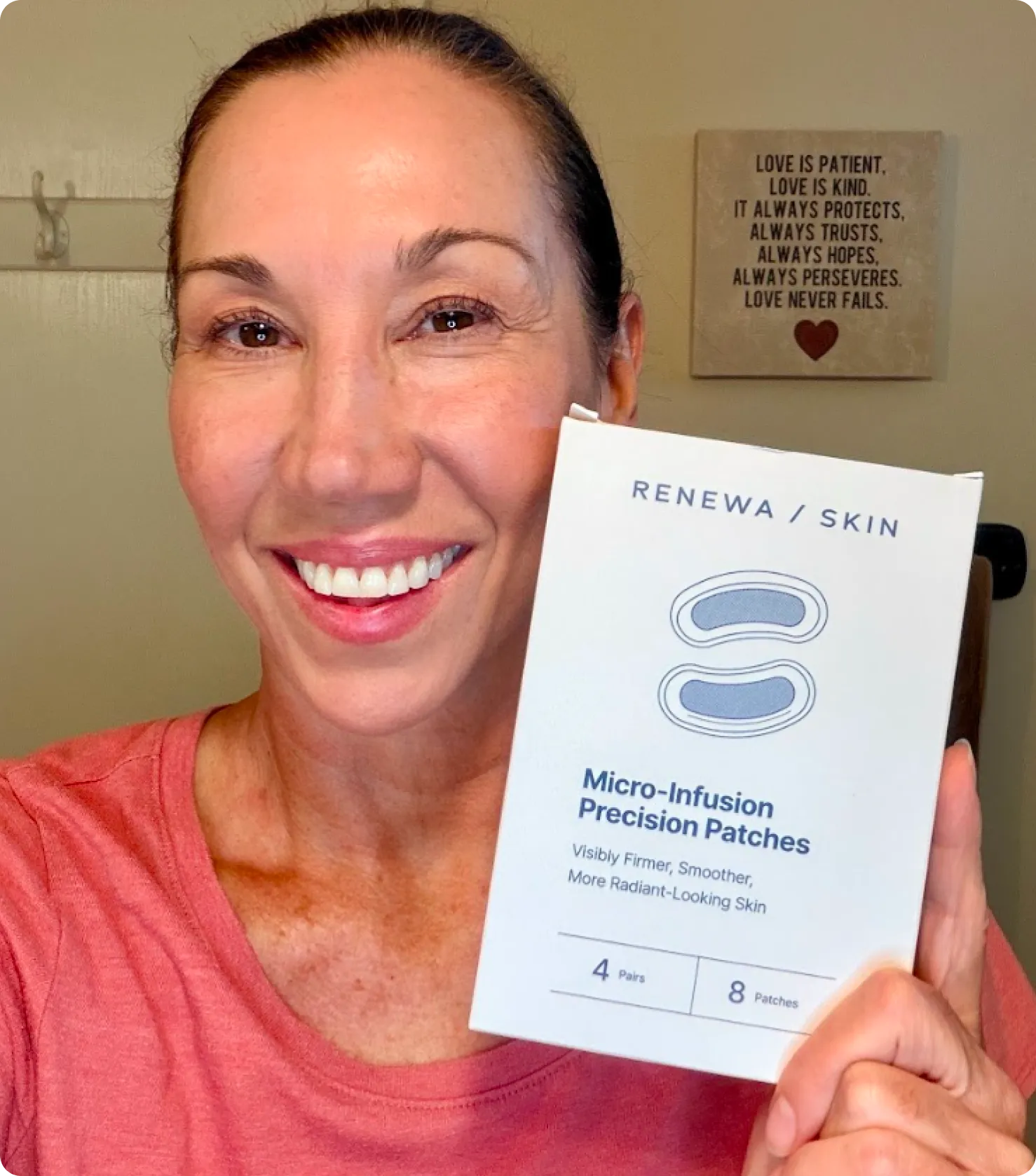 Woman holding Renewa Skin Micro-Infusion Precision Patches