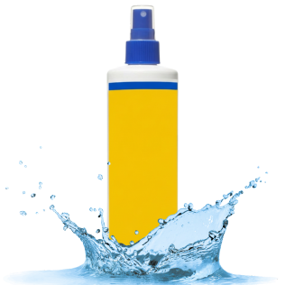 Glass of pomegranate juice beside a whole and halved pomegranate.