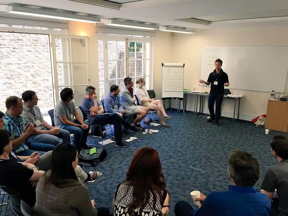 Olly running a group language session