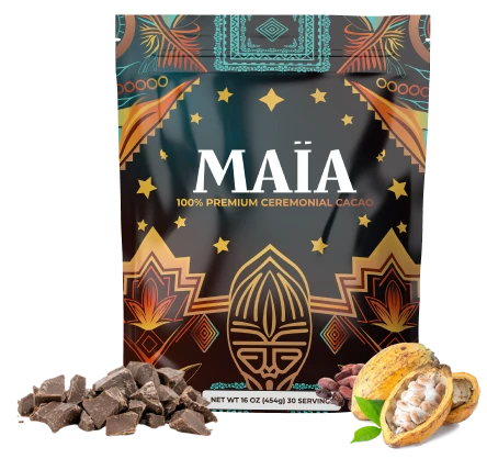 Ceremonial cacao package with geometric designs, surrounded by cacao pieces and a cacao pod.