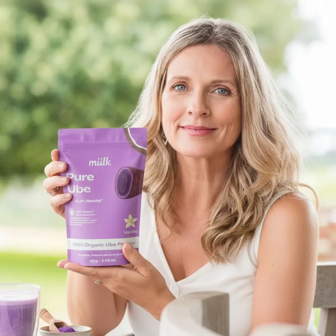 Person holding a Maia ceremonial cacao package outdoors.