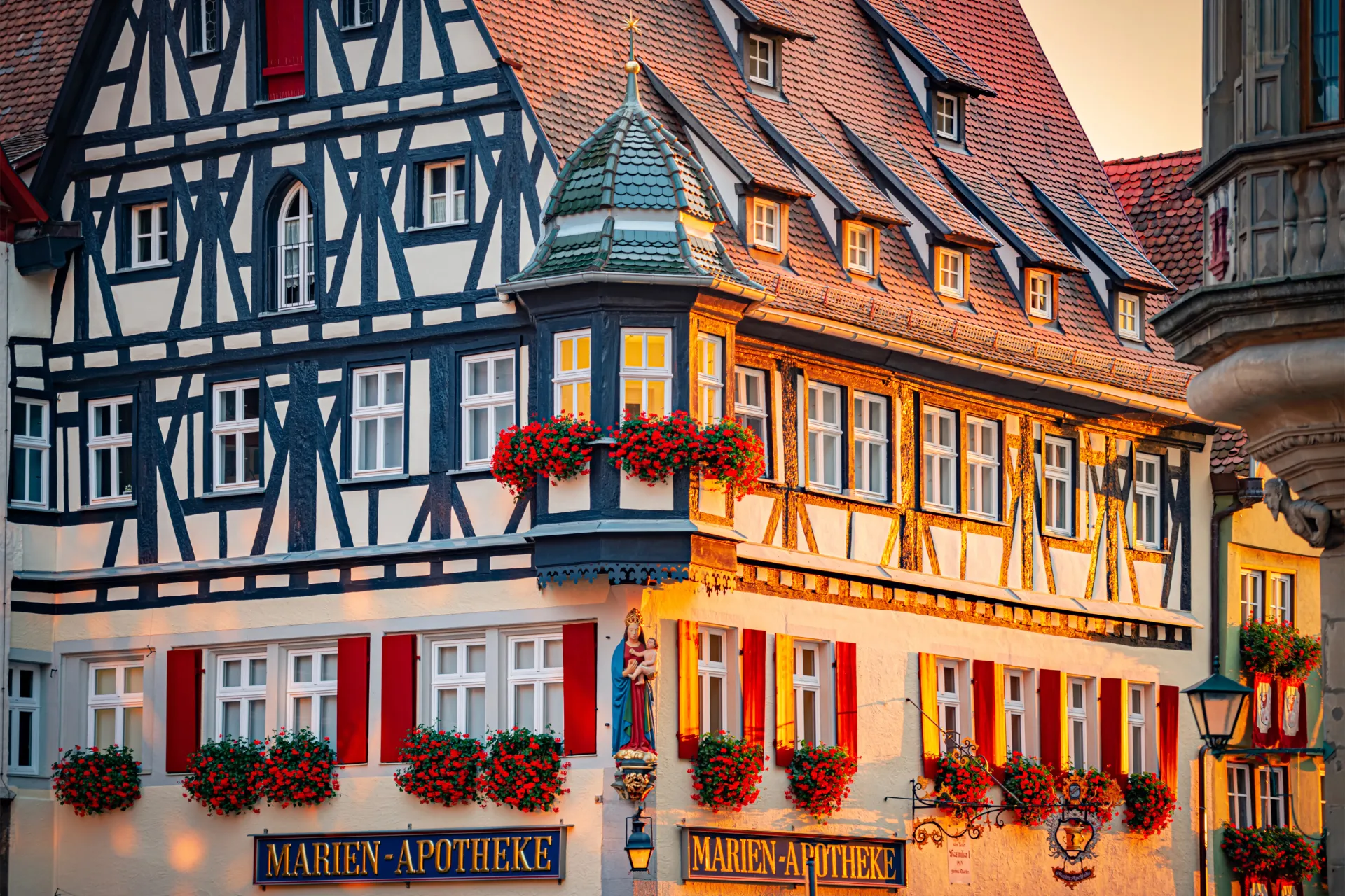 A historic German town with half-timbered houses at sunset