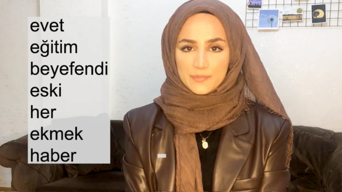 Pronunciation lesson demonstrating Turkish sounds, vowel harmony, and special characters